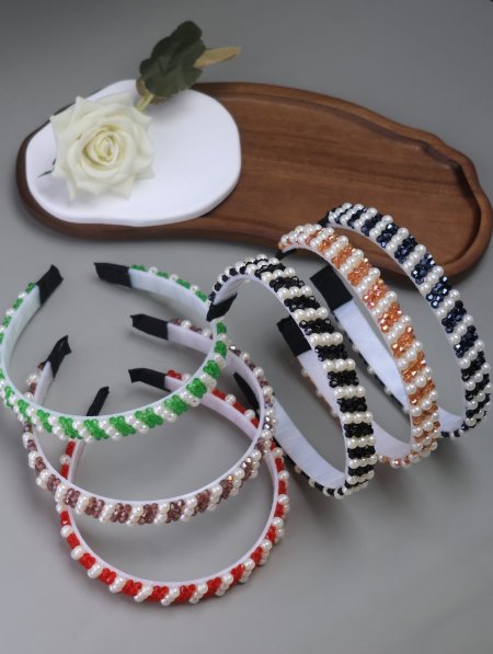 دزينة أطواق شعر مشكل.