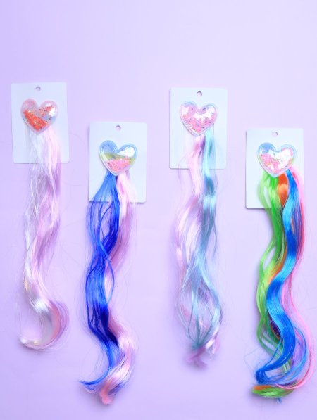 دزينة وصلات شعر ملونة للأطفال.