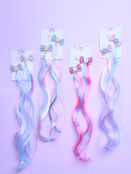 دزينة وصلات شعر ملونة للأطفال.