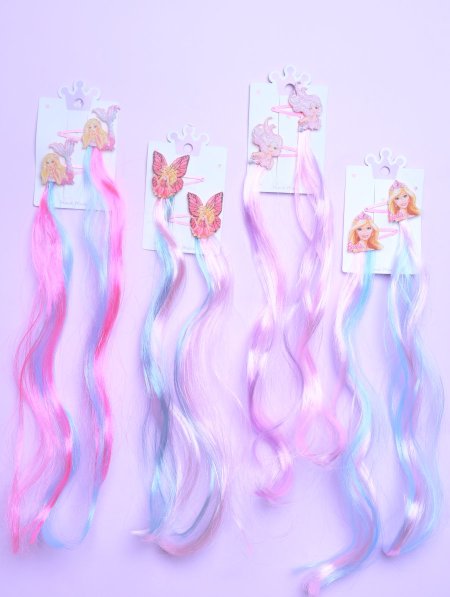 دزينة وصلات شعر ملونة للأطفال.