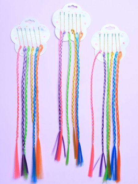 دزينة وصلات شعر ملونة للأطفال.