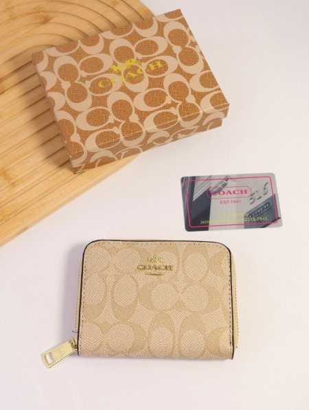 جزدان COACH / مرفق بعلبة.