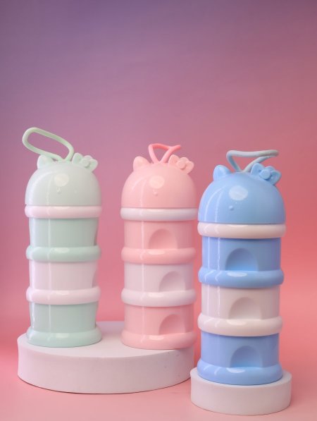 علبة حفظ حليب الأطفال المقسّمة.