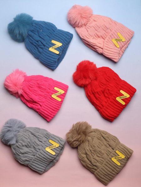 دزينة طواقي صوف مبطن طبقتين للأطفال.